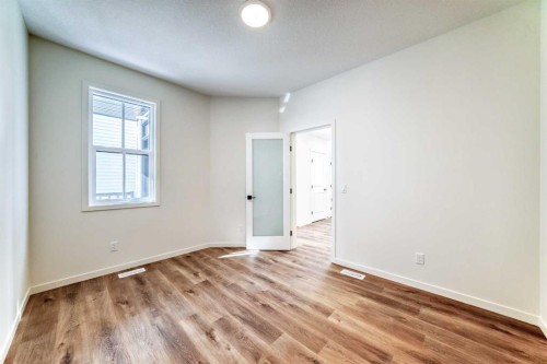 61 Bartlett Way Se, Calgary, AB - Indoor Photo Showing Other Room