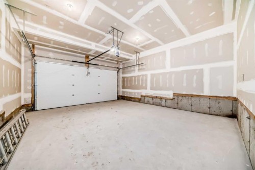61 Bartlett Way Se, Calgary, AB - Indoor Photo Showing Garage