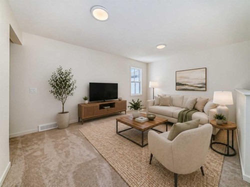 61 Bartlett Way Se, Calgary, AB - Indoor Photo Showing Living Room