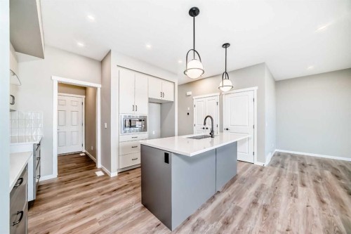 130 Bartlett Row Se, Calgary, AB - Indoor Photo Showing Kitchen With Upgraded Kitchen