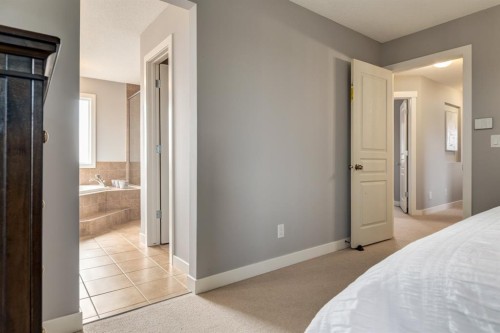 167 New Brighton Close Se, Calgary, AB - Indoor Photo Showing Bedroom