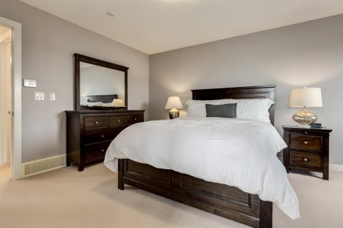 167 New Brighton Close Se, Calgary, AB - Indoor Photo Showing Bedroom
