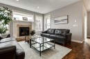 167 New Brighton Close Se, Calgary, AB  - Indoor Photo Showing Living Room With Fireplace 