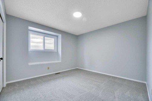 215 Hawktree Circle Nw, Calgary, AB - Indoor Photo Showing Other Room