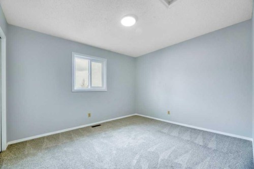 215 Hawktree Circle Nw, Calgary, AB - Indoor Photo Showing Other Room