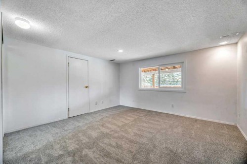 215 Hawktree Circle Nw, Calgary, AB - Indoor Photo Showing Other Room