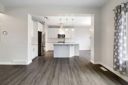 239 Kinniburgh Road, Chestermere, AB - Indoor Photo Showing Kitchen