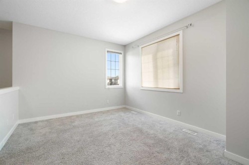 239 Kinniburgh Road, Chestermere, AB - Indoor Photo Showing Other Room