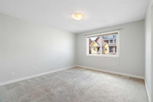 239 Kinniburgh Road, Chestermere, AB - Indoor Photo Showing Other Room