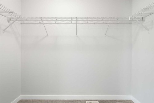 239 Kinniburgh Road, Chestermere, AB - Indoor With Storage
