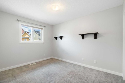 239 Kinniburgh Road, Chestermere, AB - Indoor Photo Showing Other Room