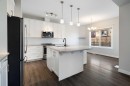 239 Kinniburgh Road, Chestermere, AB  - Indoor Photo Showing Kitchen With Stainless Steel Kitchen With Upgraded Kitchen 