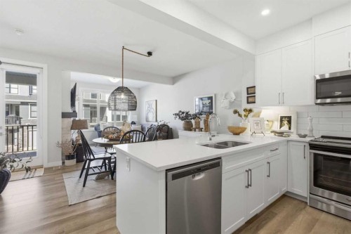307 Crestridge Common Sw, Calgary, AB - Indoor Photo Showing Kitchen With Double Sink