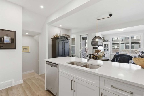 307 Crestridge Common Sw, Calgary, AB - Indoor Photo Showing Kitchen With Double Sink