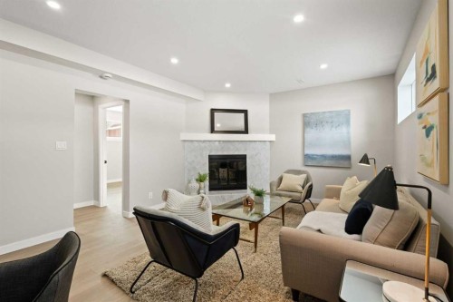 236 Silverview Way Nw, Calgary, AB - Indoor Photo Showing Living Room With Fireplace