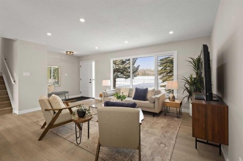 236 Silverview Way Nw, Calgary, AB - Indoor Photo Showing Living Room