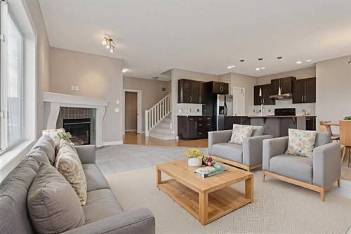 357 Kincora Drive Nw, Calgary, AB - Indoor Photo Showing Living Room With Fireplace