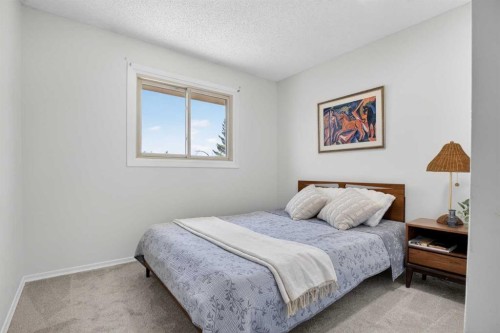 428 Ranch Estates Place Nw, Calgary, AB - Indoor Photo Showing Bedroom