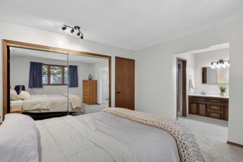 428 Ranch Estates Place Nw, Calgary, AB - Indoor Photo Showing Bedroom