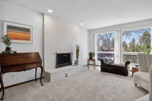 428 Ranch Estates Place Nw, Calgary, AB - Indoor Photo Showing Living Room