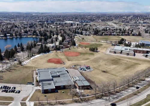 44 Midglen Drive Se, Calgary, AB - Outdoor With Body Of Water With View