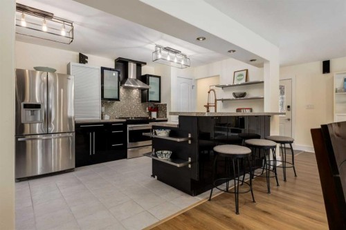 44 Midglen Drive Se, Calgary, AB - Indoor Photo Showing Kitchen With Upgraded Kitchen