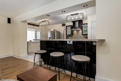44 Midglen Drive Se, Calgary, AB - Indoor Photo Showing Kitchen With Upgraded Kitchen