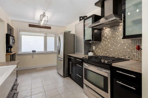 44 Midglen Drive Se, Calgary, AB - Indoor Photo Showing Kitchen With Upgraded Kitchen