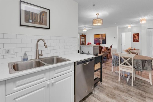 1114-1818 Simcoe Boulevard Sw, Calgary, AB - Indoor Photo Showing Kitchen With Double Sink