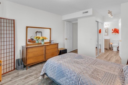 1114-1818 Simcoe Boulevard Sw, Calgary, AB - Indoor Photo Showing Bedroom