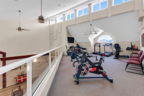 1114-1818 Simcoe Boulevard Sw, Calgary, AB - Indoor Photo Showing Gym Room