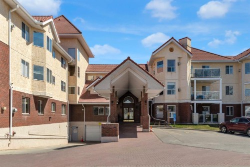 1114-1818 Simcoe Boulevard Sw, Calgary, AB - Outdoor With Facade