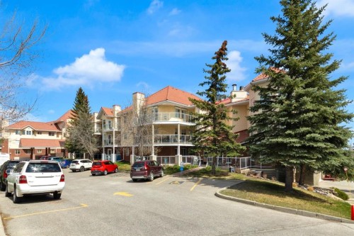 1114-1818 Simcoe Boulevard Sw, Calgary, AB - Outdoor With Facade
