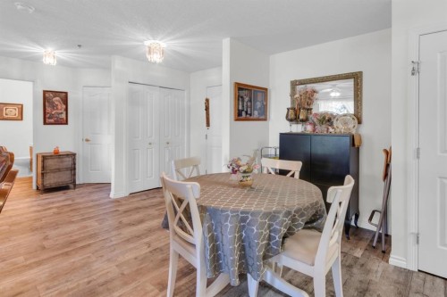 1114-1818 Simcoe Boulevard Sw, Calgary, AB - Indoor Photo Showing Dining Room