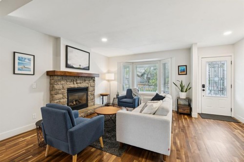 2618 24A Street Sw, Calgary, AB - Indoor Photo Showing Living Room With Fireplace