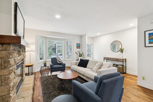 2618 24A Street Sw, Calgary, AB - Indoor Photo Showing Living Room With Fireplace