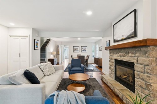 2618 24A Street Sw, Calgary, AB - Indoor Photo Showing Living Room With Fireplace