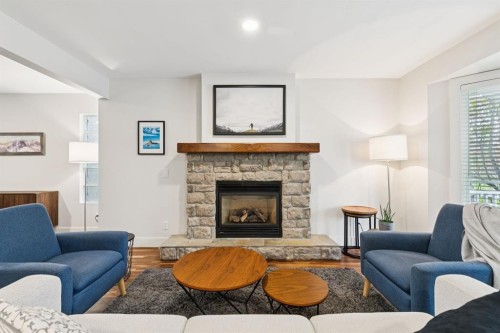 2618 24A Street Sw, Calgary, AB - Indoor Photo Showing Living Room With Fireplace