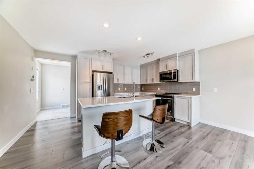 310 Sage Hill Grove Nw, Calgary, AB - Indoor Photo Showing Kitchen With Upgraded Kitchen