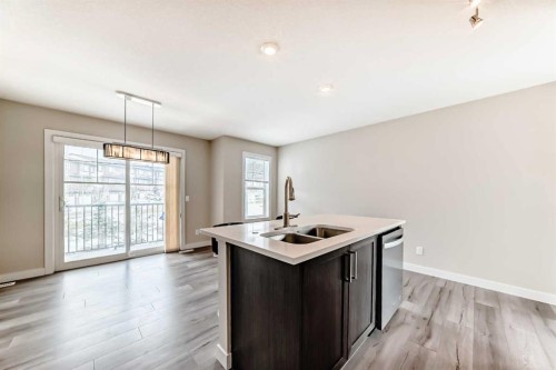 310 Sage Hill Grove Nw, Calgary, AB - Indoor Photo Showing Kitchen With Double Sink