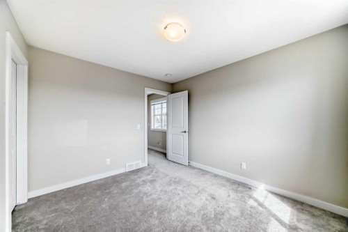 310 Sage Hill Grove Nw, Calgary, AB - Indoor Photo Showing Other Room