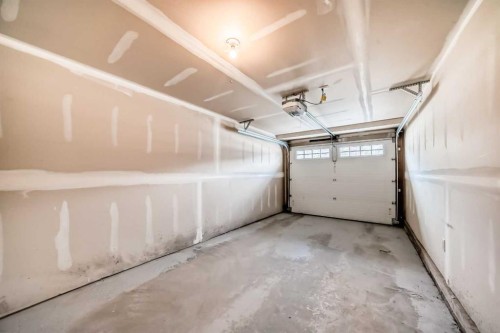 310 Sage Hill Grove Nw, Calgary, AB - Indoor Photo Showing Garage
