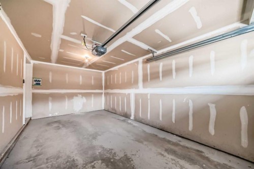310 Sage Hill Grove Nw, Calgary, AB - Indoor Photo Showing Garage