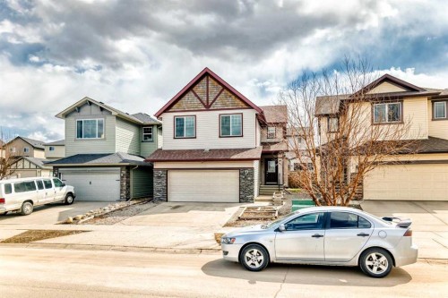 455 Cimarron Boulevard, Okotoks, AB - Outdoor With Facade