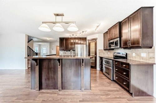 455 Cimarron Boulevard, Okotoks, AB - Indoor Photo Showing Kitchen With Upgraded Kitchen