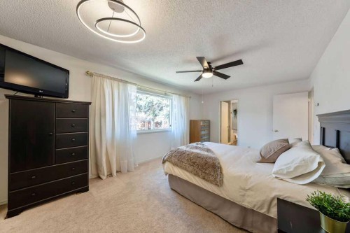 59 Strathcona Close Sw, Calgary, AB - Indoor Photo Showing Bedroom