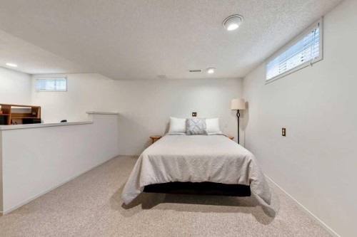 59 Strathcona Close Sw, Calgary, AB - Indoor Photo Showing Bedroom
