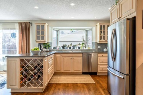 59 Strathcona Close Sw, Calgary, AB - Indoor Photo Showing Kitchen With Double Sink