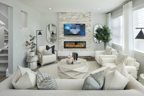 174 Setonstone Green Se, Calgary, AB - Indoor Photo Showing Living Room With Fireplace