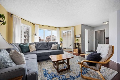 30 Arbour Ridge Circle Nw, Calgary, AB - Indoor Photo Showing Living Room
